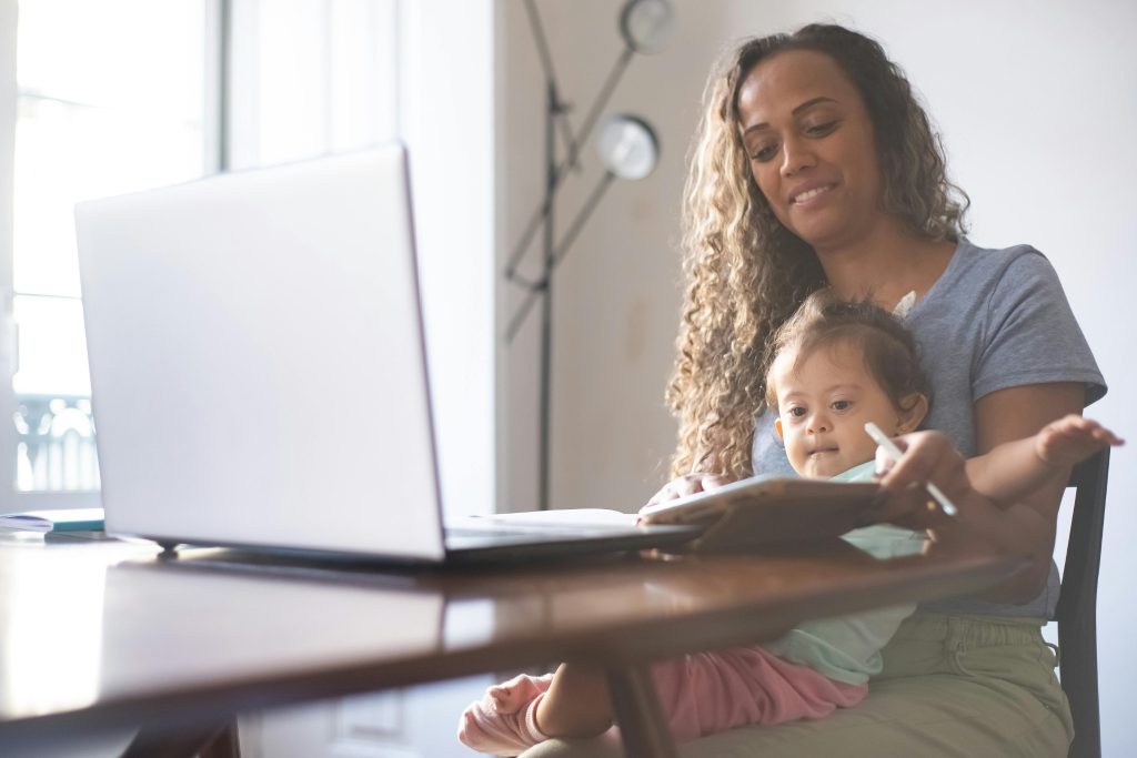 Parent supporting daughter’s learning using positive reinforcement autism